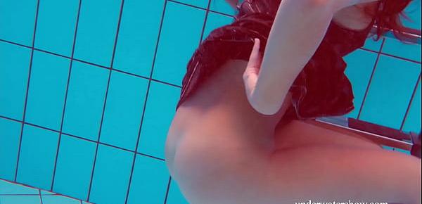  Brunette Nata Szilva strips underwater and gets horny